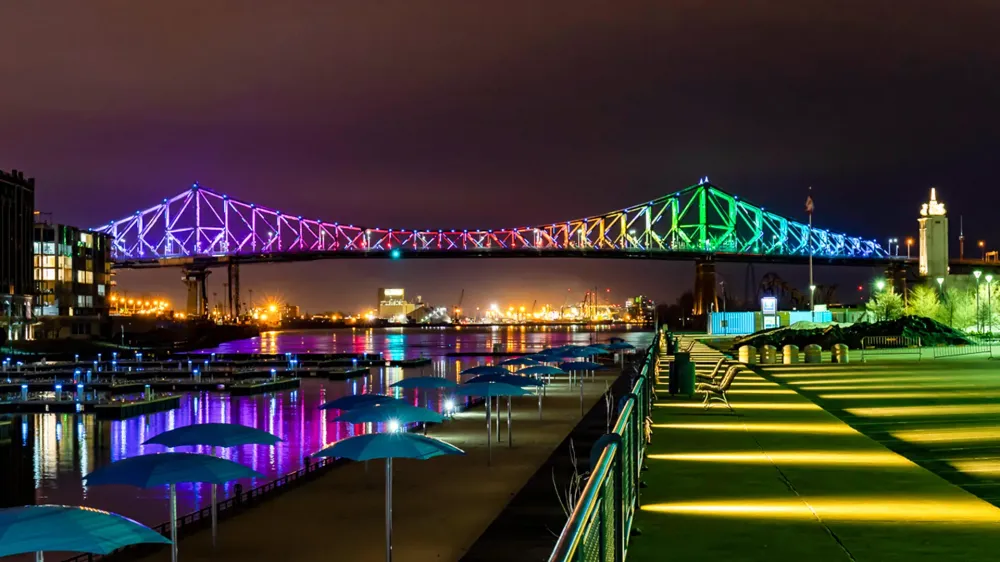 montreal rainbow bridges lit up